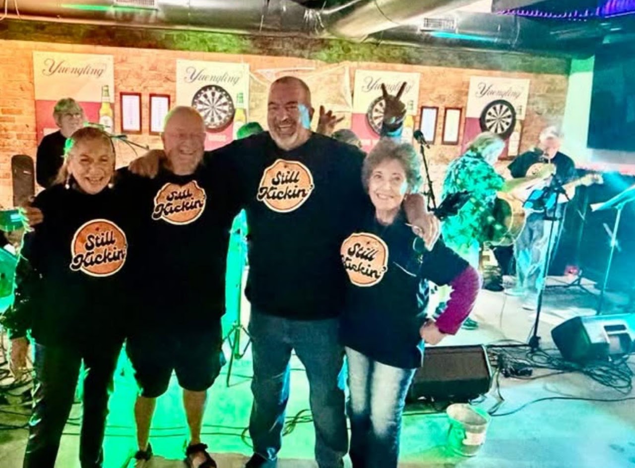 Still Kickin fans wearing their band shirts